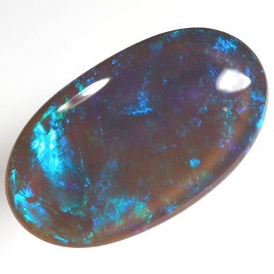 SOLID BLACK CRYSTAL OPAL Rolling flashes of green and turquoise purple fire
